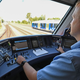 A photo of the driver in a hydrogen-powered train.